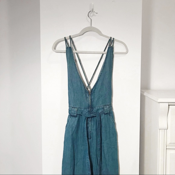 Free People Denim - ⚡️SALE Free People Plunging Denim Jumpsuit NWOT